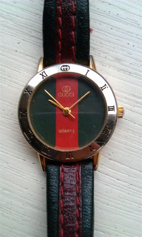 fake gucci watch gold|real Gucci watches.